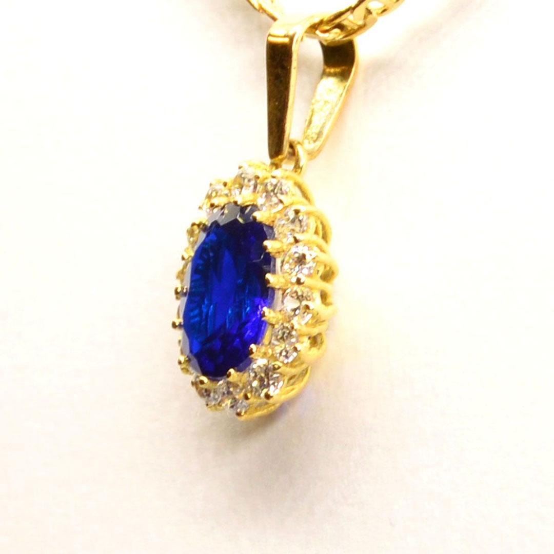 Colgante mujer oro 18k con piedra azul 101a