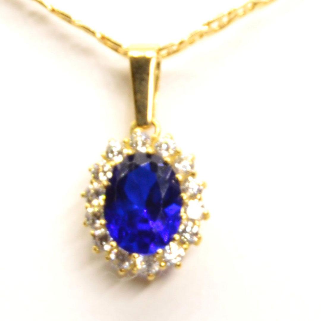 Colgante mujer oro 18k con piedra azul 101a