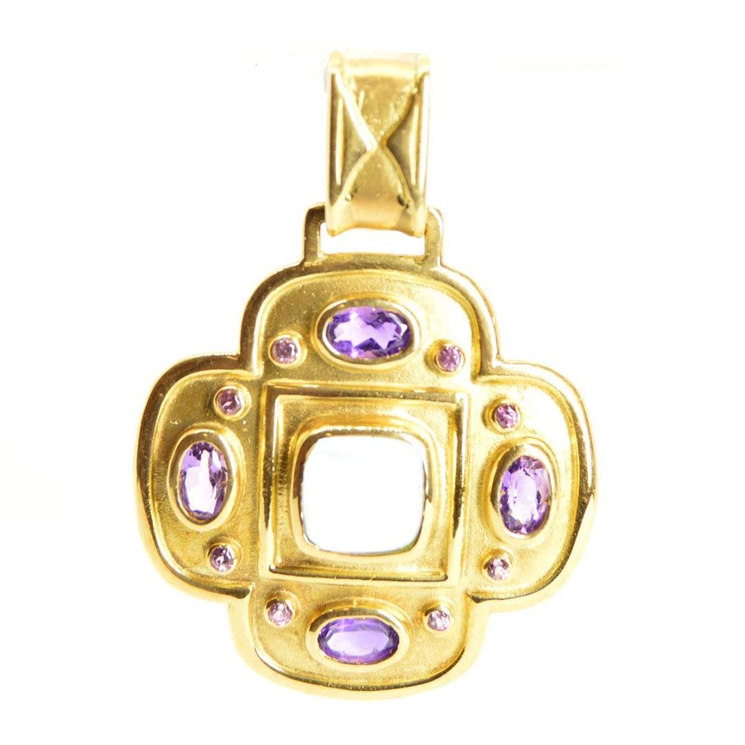 COLGANTE CRUZ ORO 18K CON PIEDRA LILA 11042