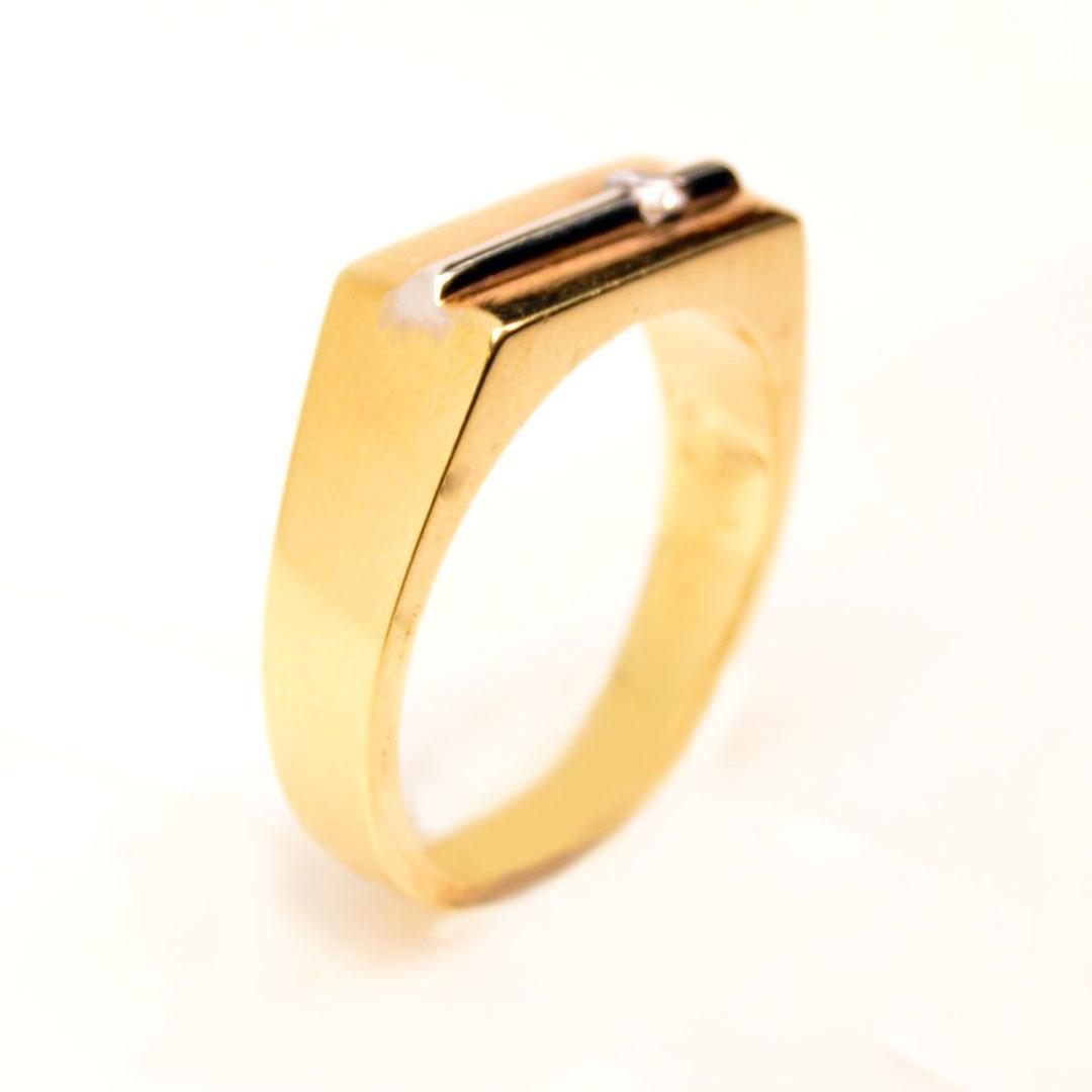 SOLITARIO HOMBRE ORO 18 K BICOLOR CON CIRCONITA